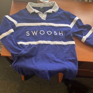 Blue Nike long-sleeve collard shirt